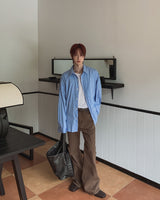 Curden Diagonal Cut Curved Bootcut Pants