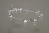 FLOATING PEARL BRACELET