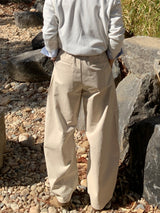 Frange Over Curved Pants