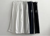 ポルティ 86 ナンバリング3ライントラックワイドパンツ