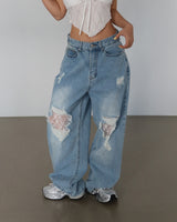 Lace torn jeans. Wide jeans