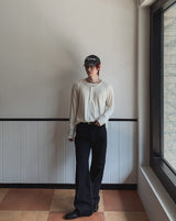 Curden Diagonal Cut Curved Bootcut Pants