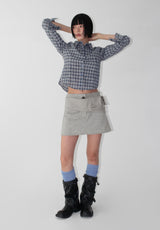 TINY BUTTON MINI SKIRT