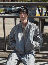 カイ ナイロン グロッシー パイピング ジップアップ