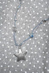 Silver star ocean blue rope necklace