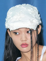 CORSAGE FLAT CAP IN EGGSHELL