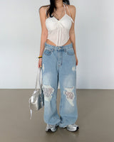 Lace torn jeans. Wide jeans
