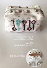 floral-embroidered pouch