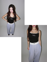 Lace lettering padded sleeveless shirt with a built-in cap