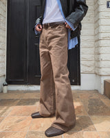 Curden Diagonal Cut Curved Bootcut Pants