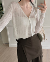 Crum see-through punching cardigan