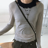 Nowell heart cutting see-through tencel wave u-neck long sleeve t-shirt