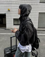Arc-in-crop windbreaker