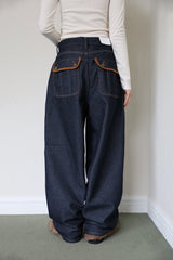 Suede patch denim pants