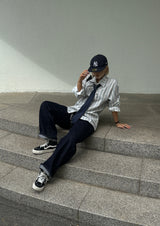  Curved stitch denim pants