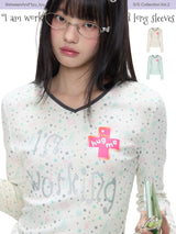 BETWEENAND　ミュージックボックス メロディー Vネック プリントTシャツ