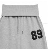 89ナンバリングフォールディングトレーニングパンツ