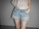 orange destroyed shorts