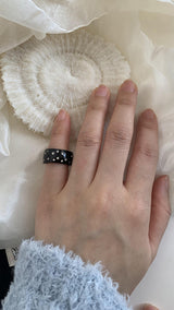 Black metal twinkle dot ring