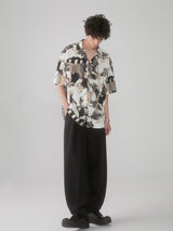 Cuban-style loose and breathable short-sleeved shirt with black and white portrait blur print.