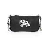 Betweenand "The original Dalmatian underarm satchel is a small black bag that people can't put down"