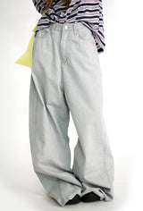 over wide gray pants