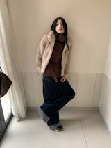 タートルネックツイストストラップスリーブレスニットウェア