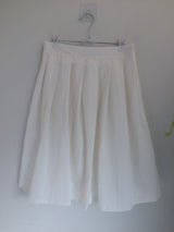 Powder pleats and pouch skirts