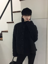 パフオーバーブークレカーディガン