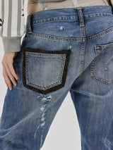 That's neat - Low-Rise Distressed Lightweight Denim Jeans