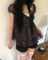 ラネルフローラルスリーブレスブラウス