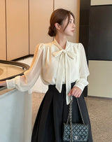 Cave Pearl Tie Puff Blouse