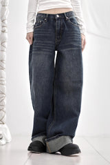 Cuffed cat washing denim pants