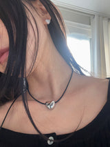 String heart necklace