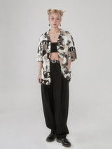 Cuban-style loose and breathable short-sleeved shirt with black and white portrait blur print.