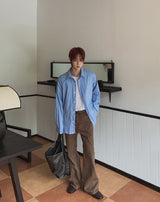 Curden Diagonal Cut Curved Bootcut Pants