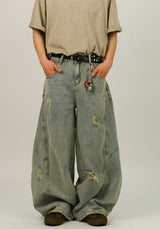 EE CURVED DAMAGE DENIM PANTS