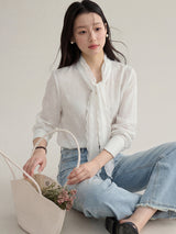French ribbon tie V-neck blouse