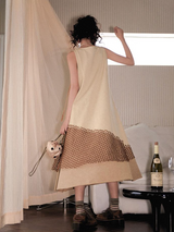 A long, loose and slimming knitted dress for a niche market.
