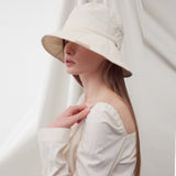 ADJUSTABLE STRAP BUCKET HAT IVORY