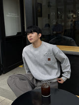 Double pocket patch cropped sweatshirt