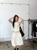  DOUBLE BUTTON PLEATS SKIRT