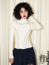 A slim-fit, color-blocked, close-knit turtleneck base layer shirt with a versatile Cuban collar and long sleeves.
