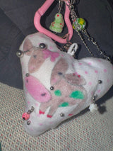 Pierced pinky cow keychain