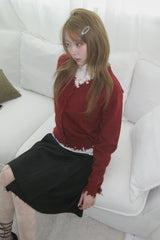 Rough damaged cardigan