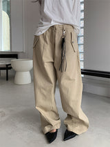 CURVED TUCK COTTON TROUSER