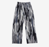 yellow-colored patterned pants
