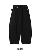 Pale studded strap pants