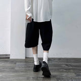 Side-Studded Pleated Baggy Shorts