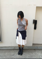 BUTTON MIDI PLEATS SKIRT